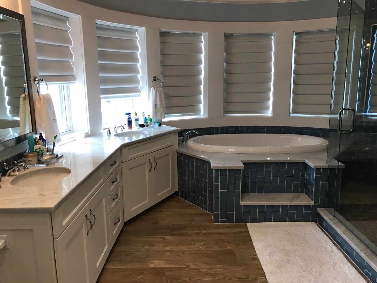 Spacious bathroom with soaking tub and vanity