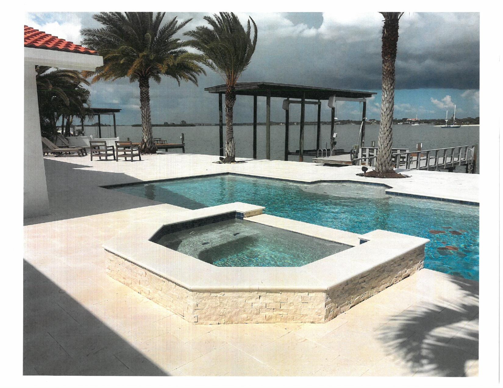 Modern waterfront pool, hot tub, palm trees