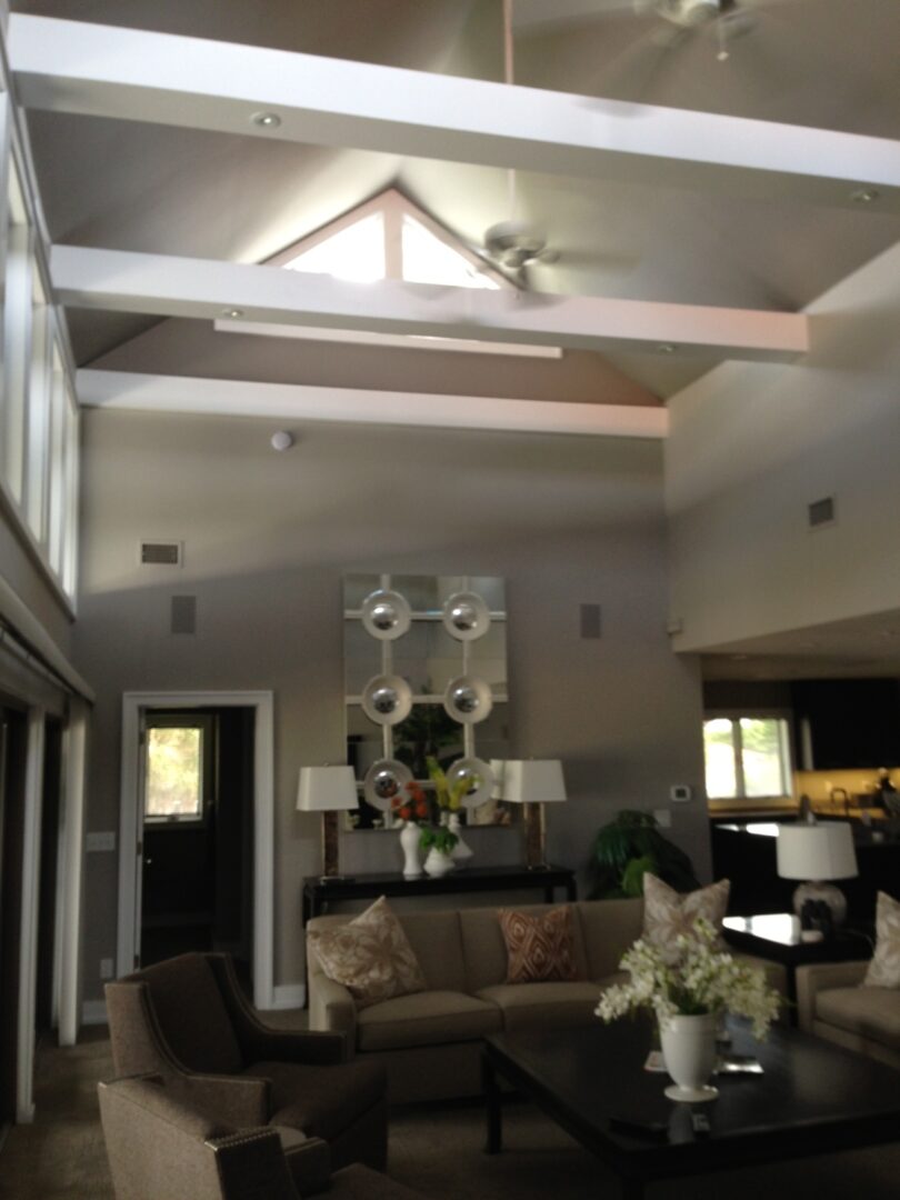 Modern living room with vaulted ceiling beams